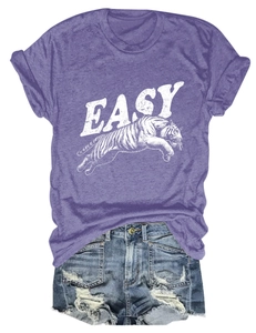 Flat lay of purple short sleeve t-shirt with tiger print and ripped denim shorts set