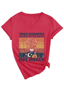 Detail of red V-neck T-shirt showing retro print and casual knotted hem design