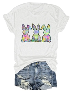 Close-up of white T-shirt featuring three colorful tie-dye bunny graphics on the chest