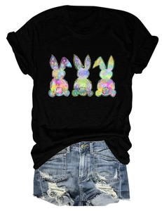 Detail of colorful graffiti rabbit print on black t-shirt with distressed denim shorts