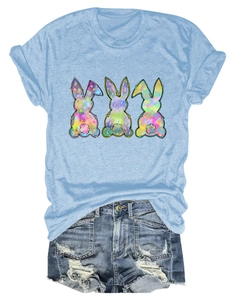 Close-up of Easter rabbit print on light blue cotton T-shirt with denim shorts set