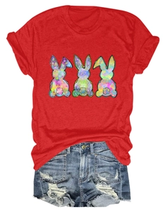 Detail of red t-shirt with rainbow rabbit print and distressed denim shorts