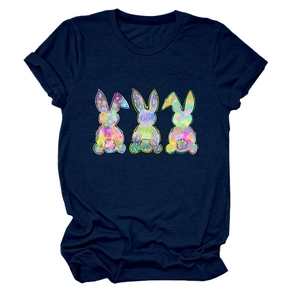 Detail of three colorful abstract rabbits printed on a navy blue cotton T-shirt