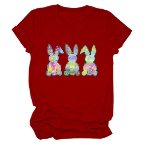 Close-up of red crew neck T-shirt featuring three colorful artistic bunny prints