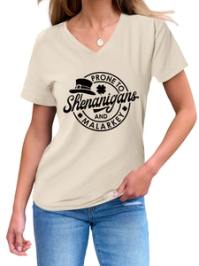 Detail of V-neck beige t-shirt with prone to shenanigans clover graphic on model
