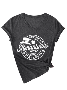 Detail of V-neck charcoal grey t-shirt with side knot and shenanigans text print