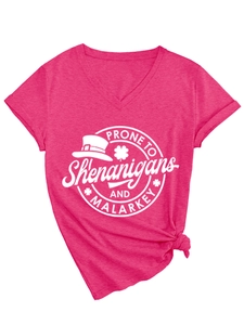 Detail of rose red V-neck T-shirt with Shenanigans print and stylish bottom knot design