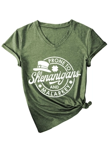 Detail of dark green V-neck St. Patrick's Day t-shirt with white festive graphic print
