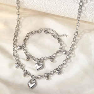 Ensemble collier et bracelet avec pendentif cœur en acier inoxydable argenté poli