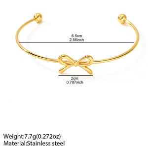 Minimalist gold bow open bracelet in stainless steel with 6.5cm diameter size specs