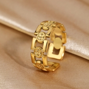 18k gold plated stainless steel open ring with cutout cross patterns on champagne silk
