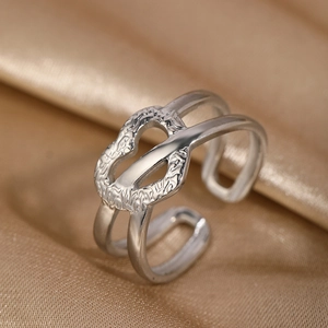 Minimalist double-layer silver stainless steel open ring with hammered texture on satin