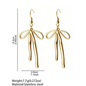 Elegant 18k gold plated stainless steel bow earrings with fluid ribbon design and dimensions