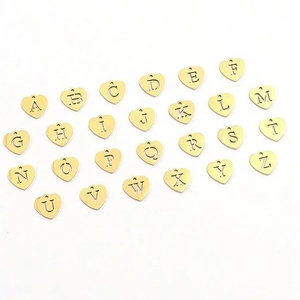 Set of 26 heart-shaped stainless steel gold pendants featuring hollow A-Z letters