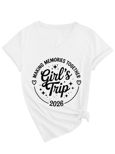 Detail of V-neck white T-shirt with Making Memories Together Girl's Trip 2026 print