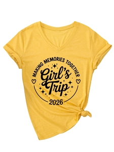Detail of yellow V-neck tee with Girl's Trip 2026 text and stylish knotted hem