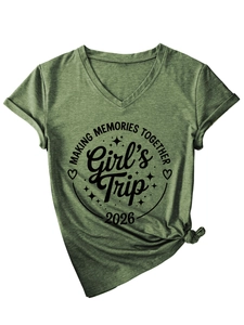 Detail view of olive green V-neck T-shirt featuring Girl's Trip 2026 print and tied hem