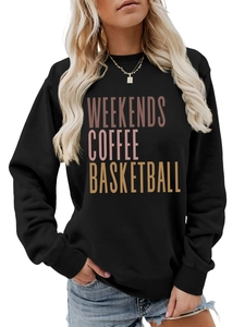 Detail of WEEKENDS COFFEE lettering on soft black crewneck sweatshirt fabric and neckline