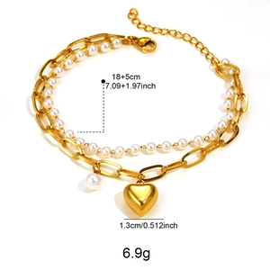 Double-layer pearl and gold link chain bracelet with a heart pendant and lobster clasp