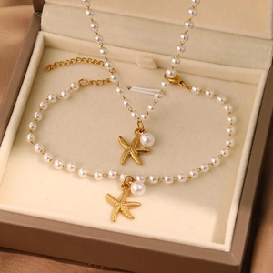 Elegant 18K gold plated pearl necklace and bracelet set with starfish charms