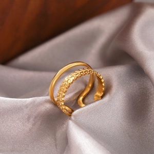 Minimalist double-layer 18K gold-plated leaf ring with wheat ear texture on grey silk