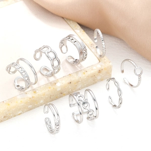 7-piece set of silver adjustable open rings featuring chain textures and hollow designs