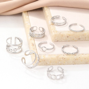 8-piece set of silver open rings with minimalist chain and twisted texture designs