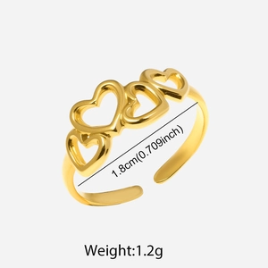 Golden open adjustable stainless steel ring with hollowed heart-shaped design pattern