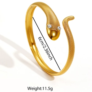 Gold snake open bangle bracelet with scale texture and white gemstone eyes for women