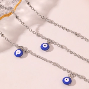 Bohemian silver evil eye anklet with blue charms and beads for beach wear