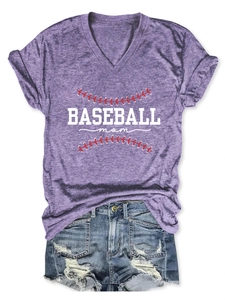 Flat lay of purple V-neck Baseball Mom t-shirt and distressed denim shorts outfit