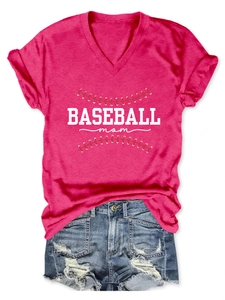 Detailed flat lay of pink V-neck T-shirt with Baseball Mom print and denim shorts