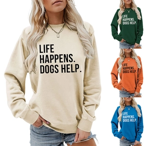 Detail view of colorful cotton sweatshirts with Life Happens Dogs Help slogan print