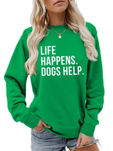 Close-up of Life Happens Dogs Help slogan print on green casual crewneck sweatshirt