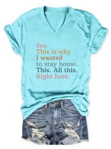 Flat lay of light blue V-neck t-shirt with quotes and distressed denim shorts