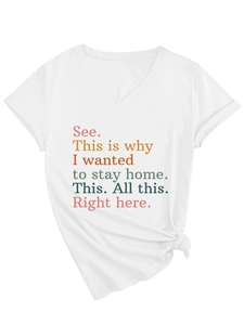 Detail of white V-neck T-shirt with colorful text print and stylish side knot at the hem