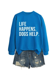 Flat lay detail of blue crewneck sweatshirt with Life Happens Dogs Help print and ripped shorts