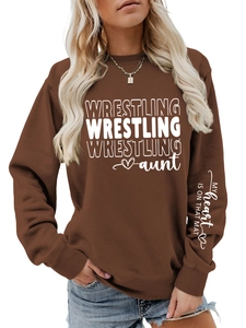 Detail of sleeve print My heart Is On That Mat on brown Wrestling Aunt sweatshirt