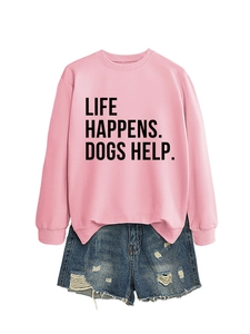 Pink slogan sweatshirt with blue ripped denim shorts laid flat on white background