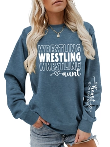 Detail of navy blue sweatshirt featuring sleeve print My heart is on that mat