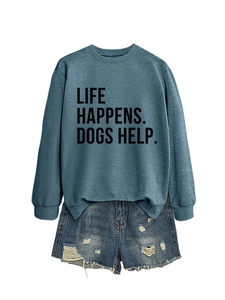 Detail of blue crewneck sweatshirt featuring Life Happens Dogs Help text print design