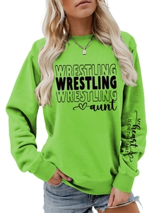 Detail of lime green sweatshirt sleeve with My Heart Is On That Mat text and ribbed cuff