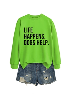 Detail of green sweatshirt with Life Happens Dogs Help print and frayed denim shorts