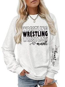 Close-up of MY HEART IS ON THAT MAT text print on the sleeve of a gray sweatshirt