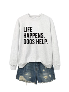 Detail of grey sweatshirt with Life Happens Dogs Help slogan and distressed denim shorts
