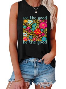 Detail eines schwarzen Baumwoll-Tops mit bunten Blumen und inspirierendem Spruch