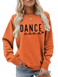 Detail of orange crewneck sweatshirt featuring black DANCE mama print and ribbed cuffs