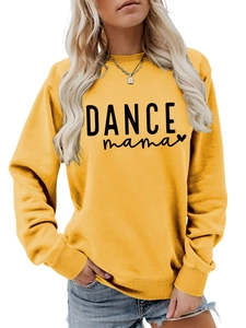 Close-up of DANCE mama logo print on bright yellow crewneck sweatshirt fabric