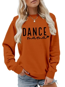 Detail of orange crewneck sweatshirt featuring black DANCE mama print and ribbed cuffs
