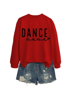 Flat lay of a red crewneck sweatshirt with DANCE mama print and ripped denim shorts